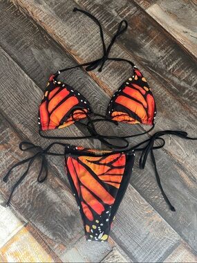 NWOT Orange, butterfly, bikini, black and orange size medium